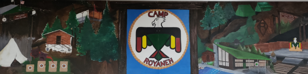 Mural in the dining hall at Camp Royaneh depicting camp scenes and the Thunderbird logo.